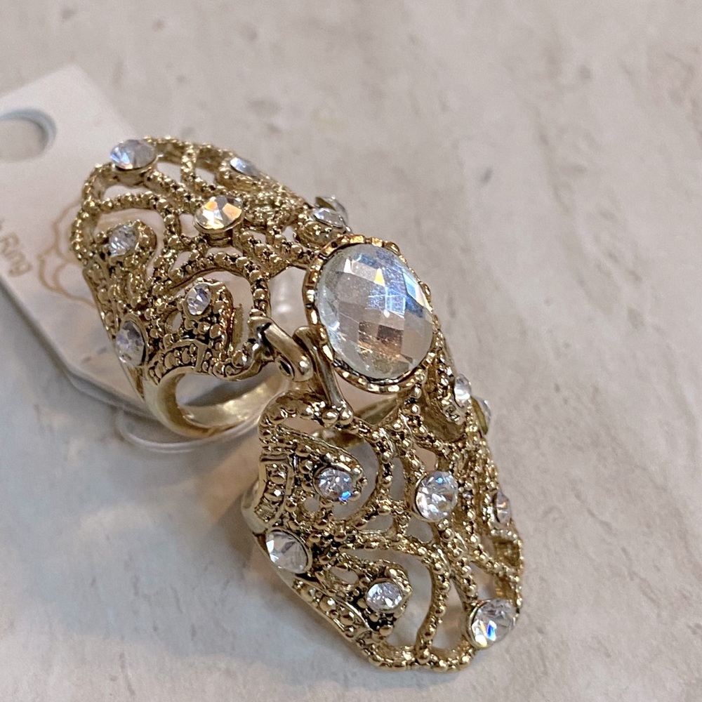 Above and below knuckle gold ring